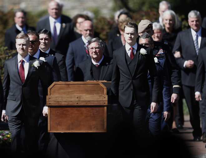 The&#x20;casket&#x20;of&#x20;The&#x20;Rev.&#x20;Billy&#x20;Graham&#x20;is&#x20;moved&#x20;during&#x20;a&#x20;funeral&#x20;service&#x20;at&#x20;the&#x20;Billy&#x20;Graham&#x20;Library&#x20;for&#x20;the&#x20;Rev.&#x20;Billy&#x20;Graham,&#x20;who&#x20;died&#x20;last&#x20;week&#x20;at&#x20;age&#x20;99,&#x20;Friday,&#x20;March&#x20;2,&#x20;2018,&#x20;in&#x20;Charlotte,&#x20;N.C.&#x20;