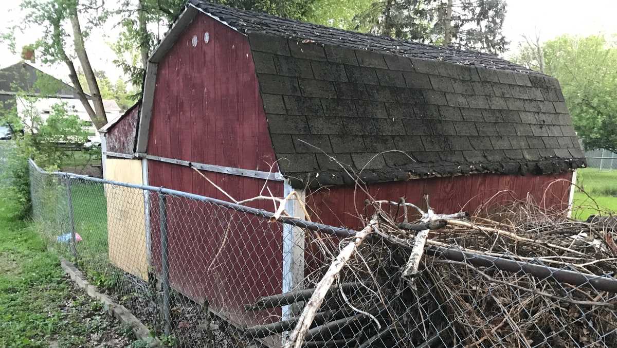 Neighbors stunned after Blanchester woman found trapped in backyard shed