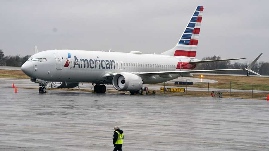 FILE - In this Dec. 2, 2020 file photo, an American Airlines Boeing 737 Max jet plane is parked at a maintenance facility in Tulsa, Okla.  Paying passengers were scheduled to board a Boeing 737 Max in Miami on Tuesday, Dec. 29 for the first time since safety regulators allowed the plane to fly again after two deadly crashes.
The American Airlines flight is scheduled to land at New York’s LaGuardia Airport with about 100 passengers aboard, according to an airline spokeswoman.
