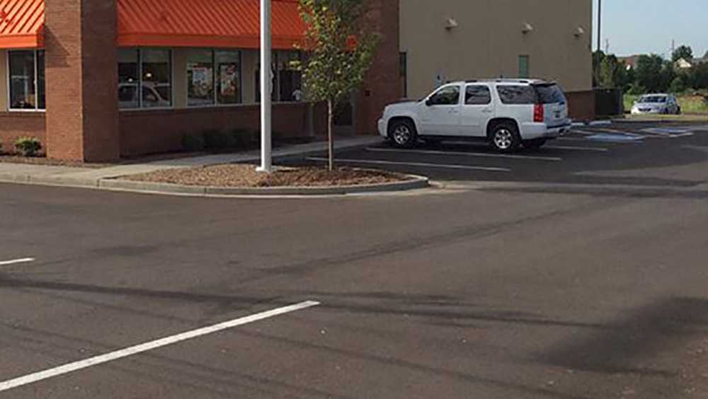 Man dies after being hit by vehicle backing out of parking space at ...