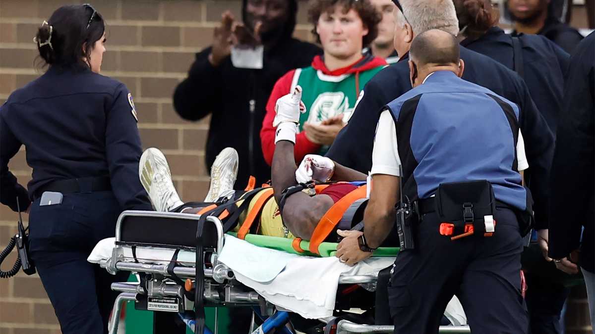 Two Eagles players stretchered off field after neck injuries during game