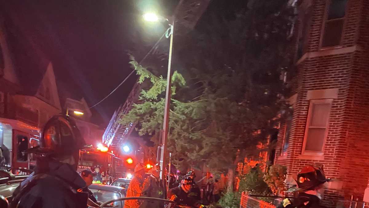 Crews battle fire in multi-family home in Boston