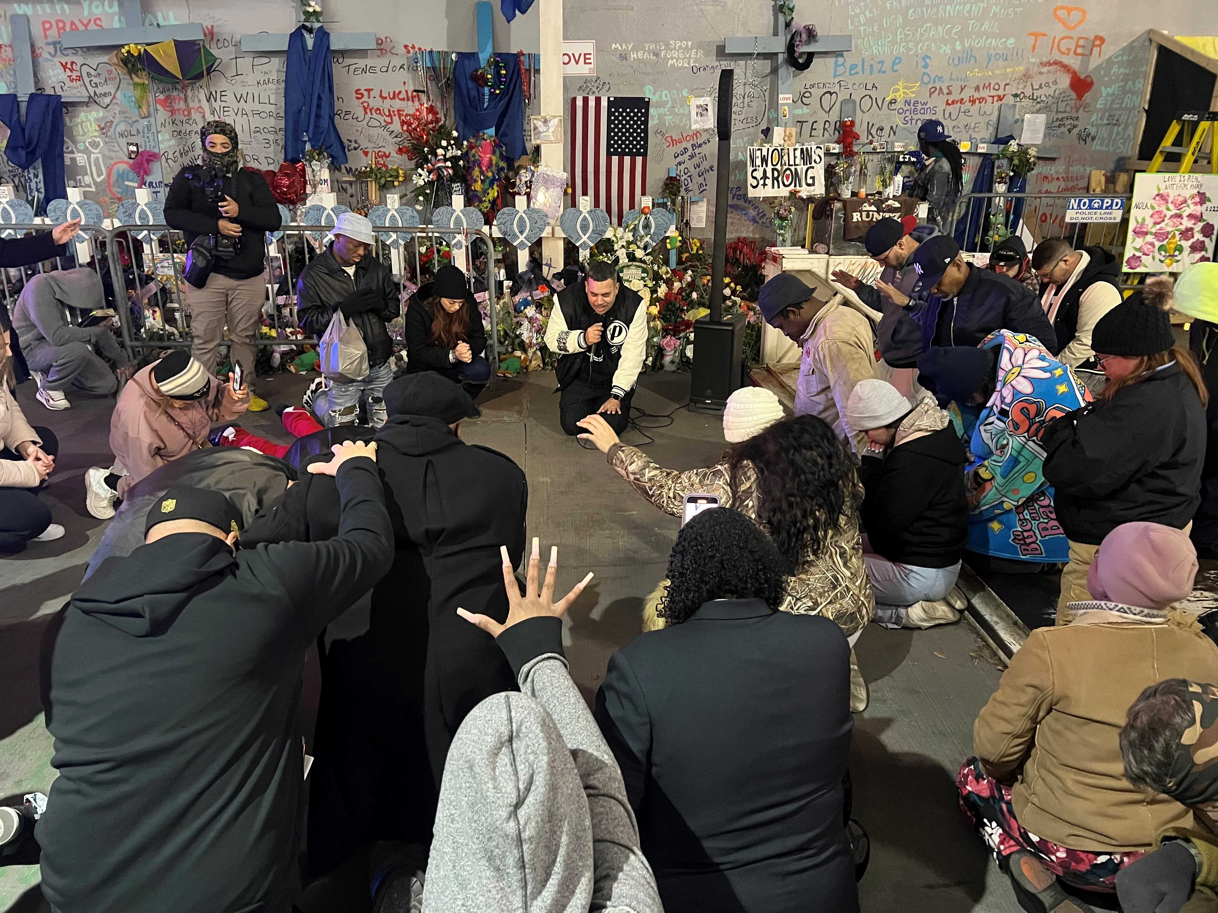 Vigil held on Bourbon, praying for peace and eradicating fear