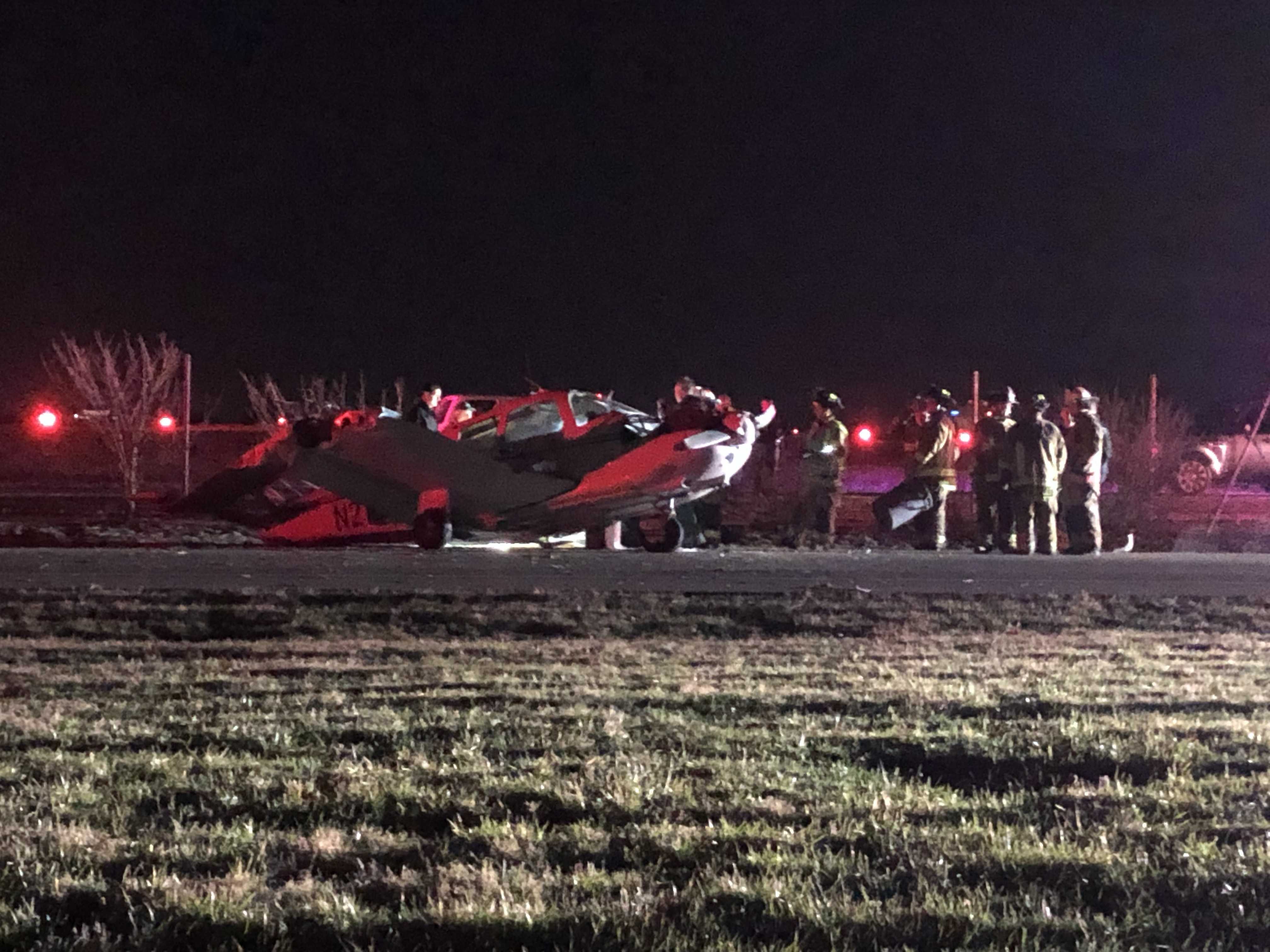Plane slides off runway at Bowman Field