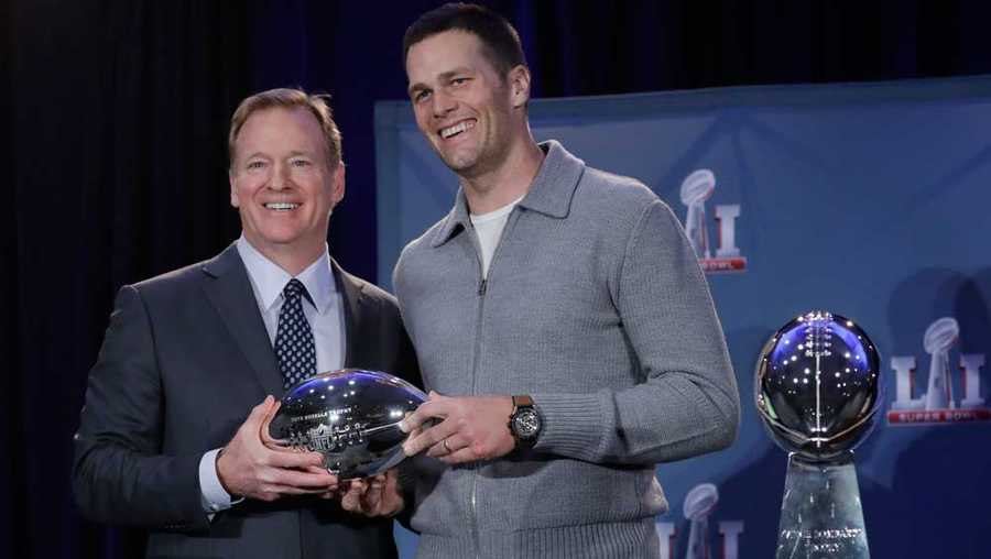 NFL commissioner Roger Goodell and New England Patriots quarterback Tom Brady pose with the MVP trophy during a news conference after the NFL Super Bowl 51 football game Monday, Feb. 6, 2017, in Houston. Brady was named the MVP of Super Bowl 51.
