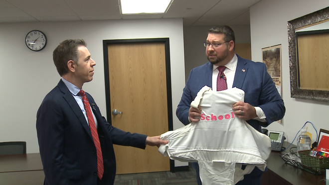 lomira&#x20;&#x28;wisc.&#x29;&#x20;schools&#x20;administrator&#x20;ty&#x20;breitlow&#x20;shows&#x20;chief&#x20;national&#x20;investigative&#x20;correspondent&#x20;mark&#x20;albert&#x20;a&#x20;white&#x20;bullet-resistant&#x20;vest&#x20;he&#x20;keeps&#x20;in&#x20;his&#x20;district&#x20;closet&#x20;in&#x20;case&#x20;of&#x20;gunfire&#x20;on&#x20;campus