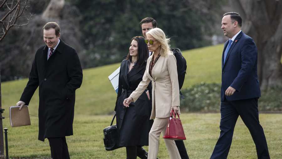 White House Political Director Brian Jack, left, Deputy Staff Secretary to the President Catherine Keller, Counselor to the President Kellyanne Conway, aide John McEntee, back center, and White House Social Media Director Dan Scavino walk on the South Lawn of the White House before departing on Marine One with President Donald Trump, Thursday, Jan. 23, 2020, in Washington.