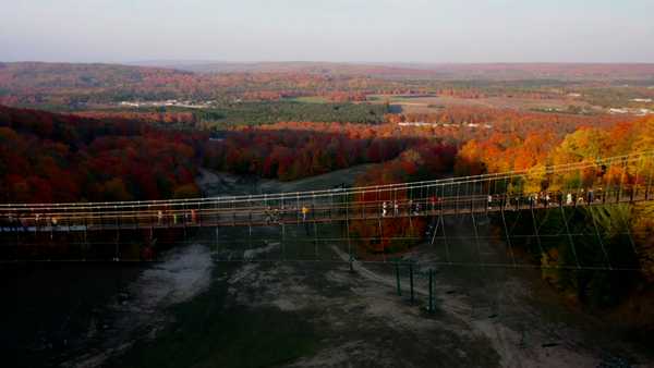 world's longest timber-towered suspension bridge opens