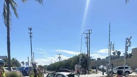 Driver and passenger transported via Trauma hawk after car collides with Brightline