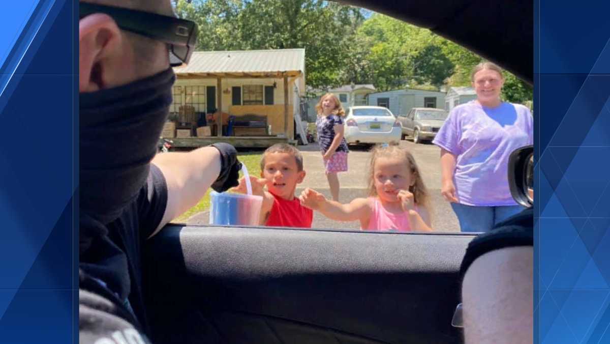 Brookside Police Department hand out sidewalk chalk to neighborhood kids