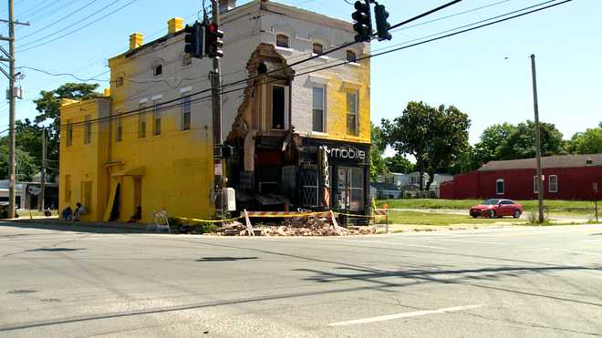 PHOTOS: Car crashes into Louisville Boost Mobile building