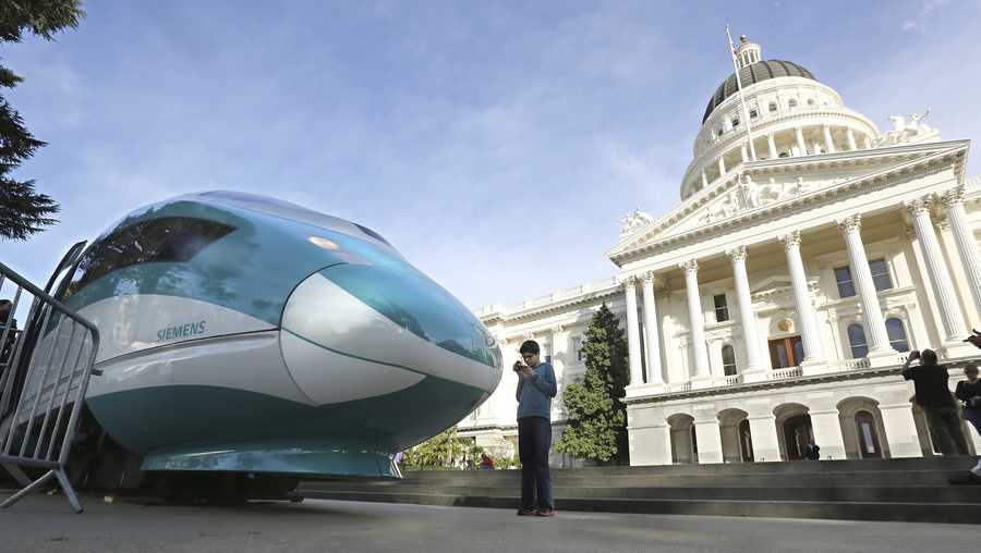 FILE — In this Feb. 26, 2015, file photo, a full-scale mock-up of a high-speed train is displayed at the Capitol in Sacramento, Calif. Lawmakers and the Newsom administration are still trying to reach agreement on whether to give the project $4.2 billion that&apos;s left in the bond fund voters approved for high-speed rail in 2008. Rail officials say the need it to continue construction beyond next summer, but some state lawmakers want more oversight of the project before releasing it. (AP Photo/Rich Pedroncelli, File)