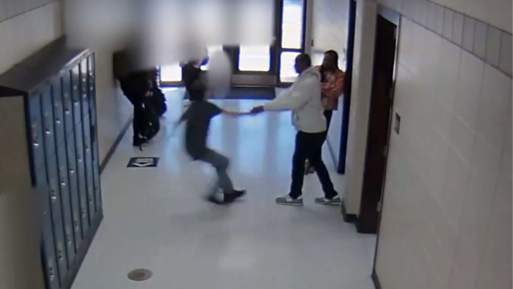 teacher suspended after shoving student into lockers