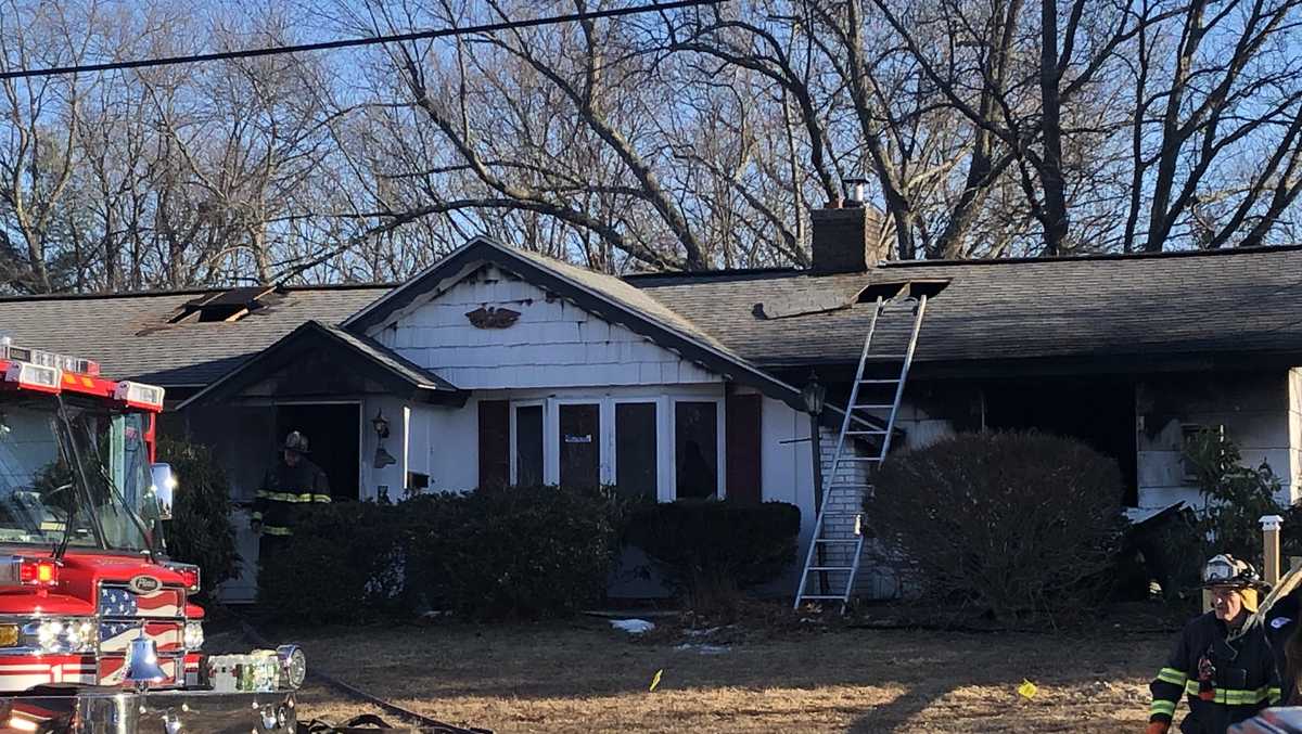 Man dies in Burlington house fire; Woman rescued by FedEx driver