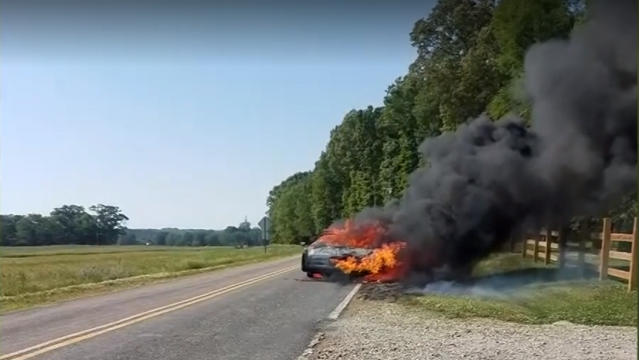 Dad, son save disabled man from burning car