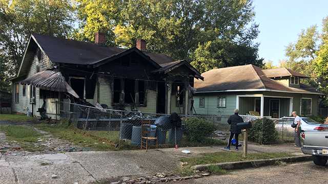 Seven escape, one treated for smoke inhalation after house fire