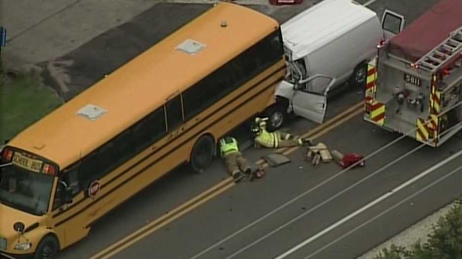Van driver killed, four students hurt after van hits school bus in ...