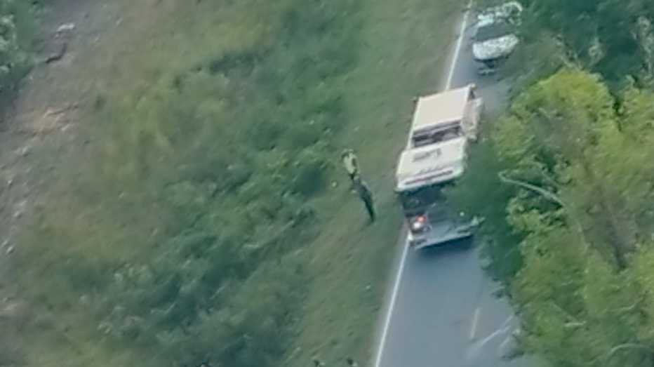 Driver charged with reckless driving after crashing into school bus ...