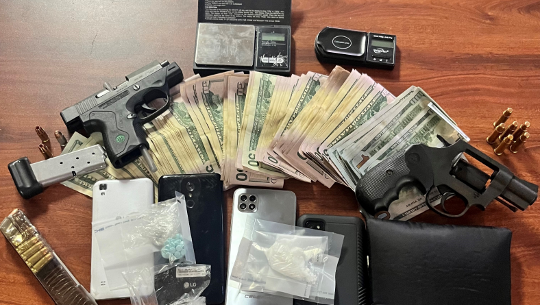 Deputies: 2 men arrested after drugs, firearms and cash seized in ...