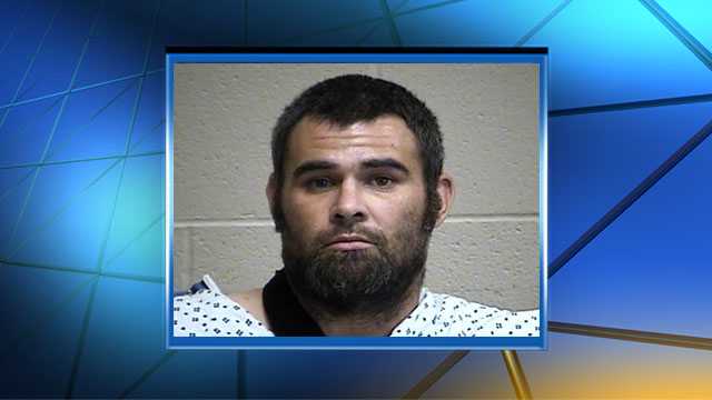 Man accused of killing Tecumseh officer booked into jail