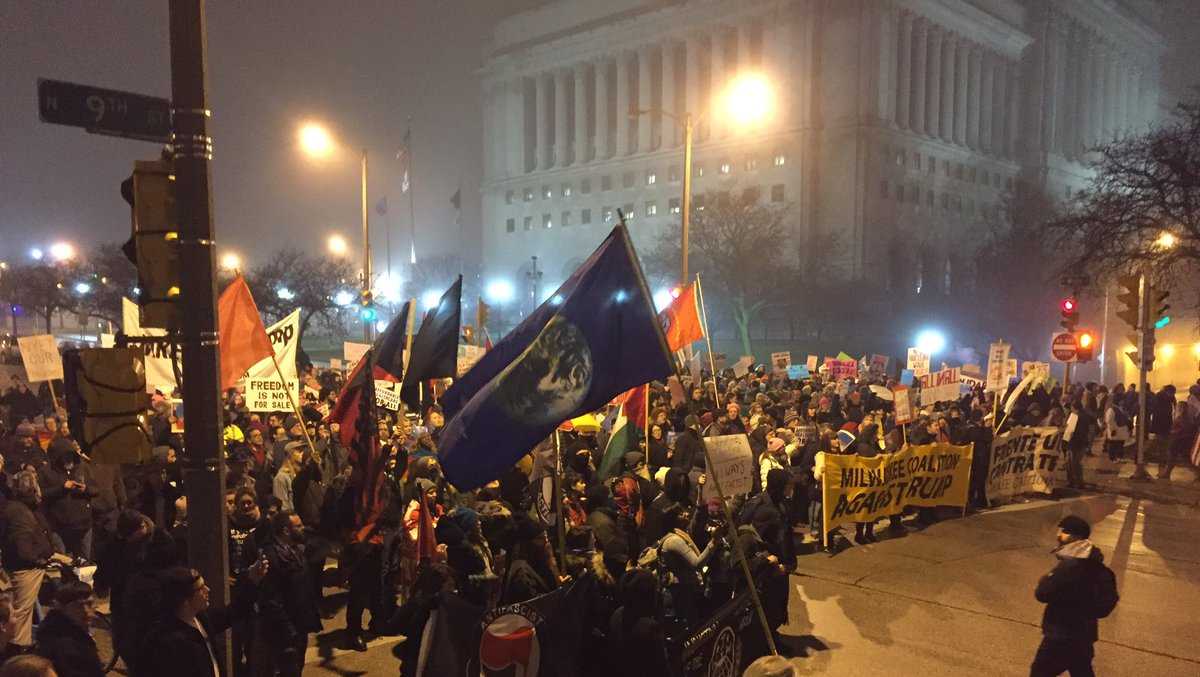 Anti-Trump protesters march downtown Milwaukee