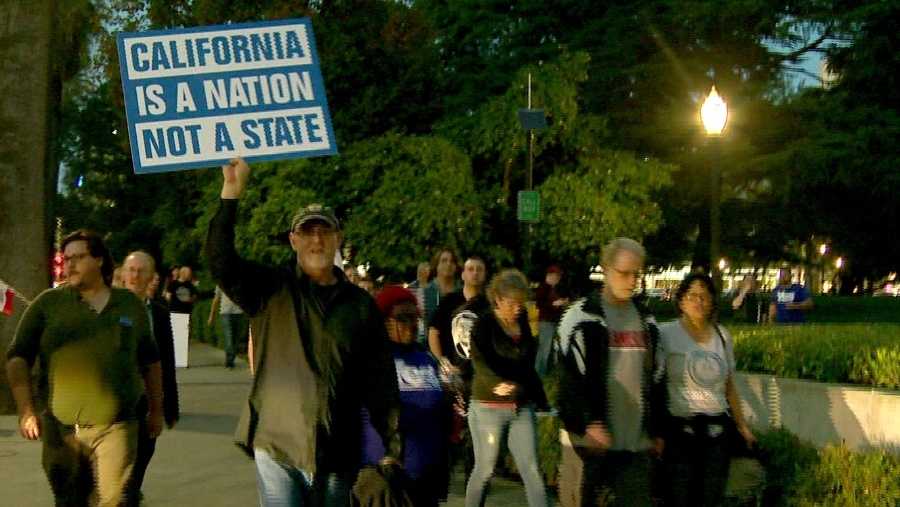 People marched on the state Capitol Wednesday, Nov. 9, 2016, urging Californians to secede from the U.S.