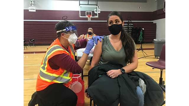 Front-line workers get COVID-19 vaccine at Carroll County clinic.
