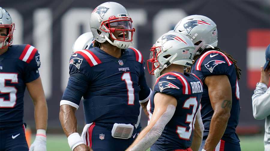 New England Patriots quarterback Cam Newton (1) gives a shout as the team warms up before an NFL football game against the Las Vegas Raiders, Sunday, Sept. 27, 2020, in Foxborough, Mass. (AP Photo/Charles Krupa)