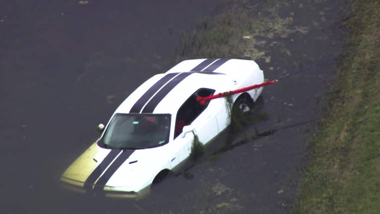 Road ranger rescues driver from submerged car in Orange County