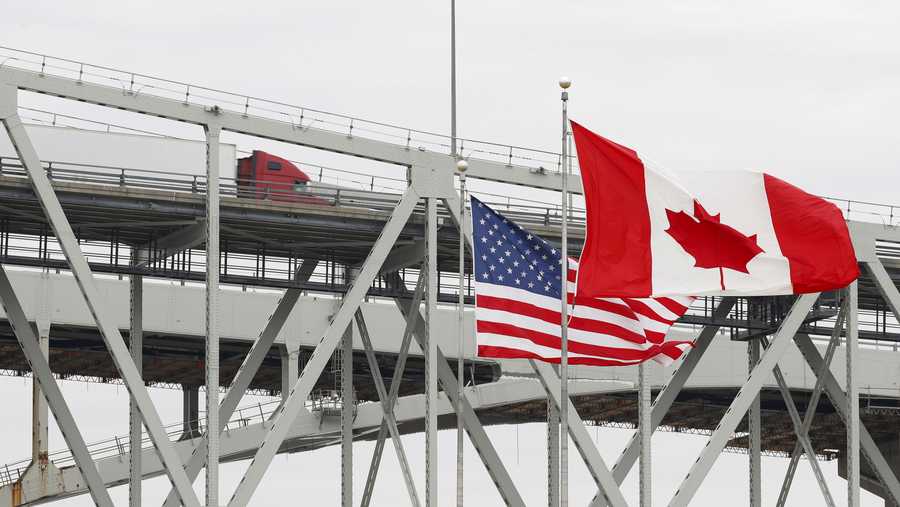 FILE: A truck crosses the Blue Water Bridge into Port Huron, Mich., from Sarnia, Ontario, Canada.