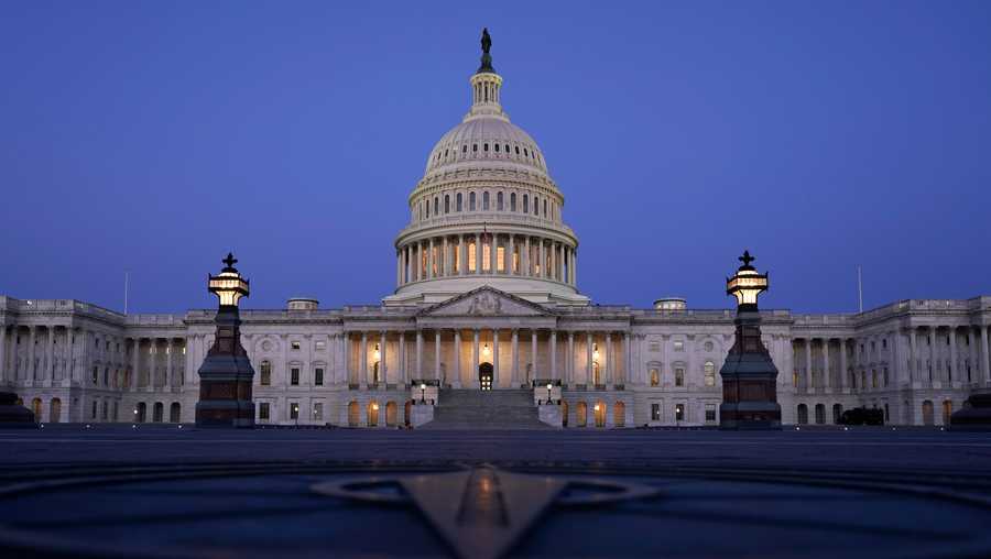 In this March 5, 2021, file photo The Capitol is seen just before sunrise in Washington.