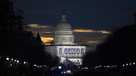The sun rises behind the Capitol in Washington, Friday, Jan. 20, 2017, where Donald Trump will be sworn-in as the 45th President of the United States.