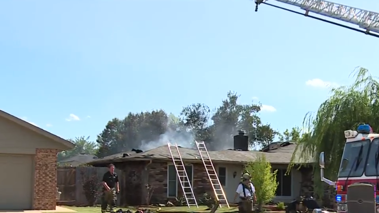 Crews battle house fire in northwest Oklahoma City