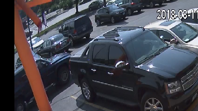 Photos: KCPD asking for help to identify suspect in phone store robbery