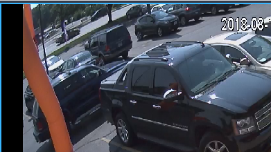 Photos: KCPD asking for help to identify suspect in phone store robbery