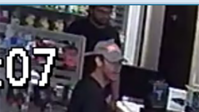 Photos: KCPD asking for help to identify suspect in phone store robbery