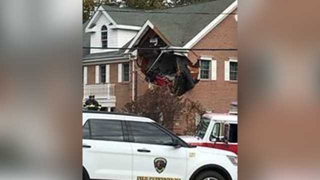 Speeding Porsche Crashes Into Second Story Of Building In New Jersey