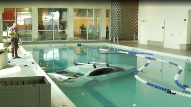 Swimmer injured after car crashes through Ohio LA Fitness, lands in pool
