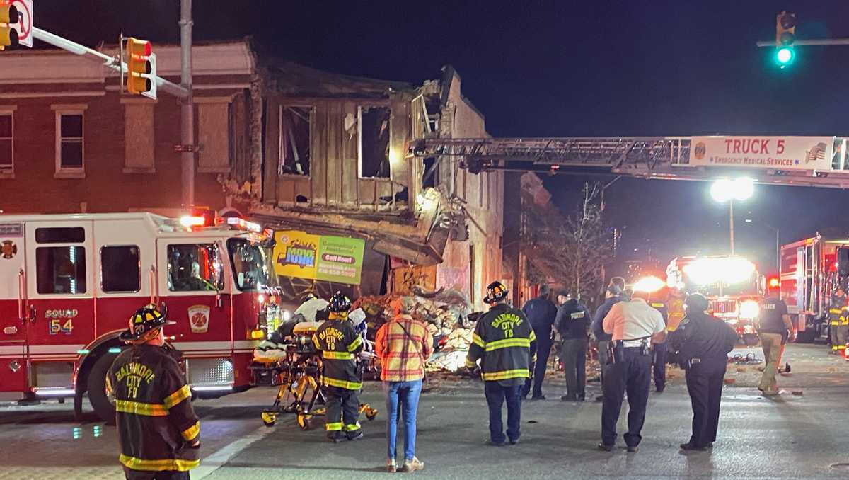 1 dead, 5 injured after car crashes into building, collapse