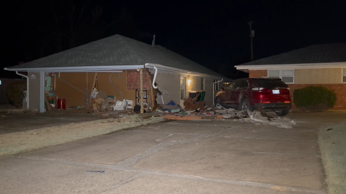 Oklahoma City police search for suspect who crashed into home