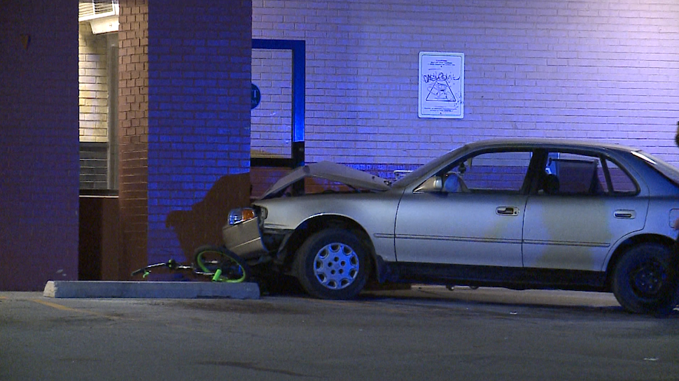 One person injured when car hits person, building