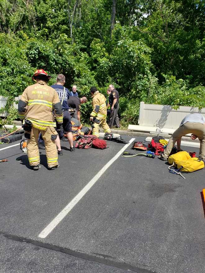 Person rescued after car goes through fence, into creek in Sycamore