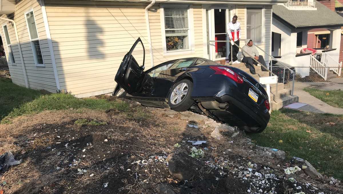 Police: Man hospitalized after car crashes into home in Mt. Auburn