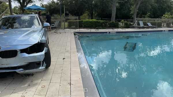 BMW smashes through New Smyrna Beach pool deck, injuring person