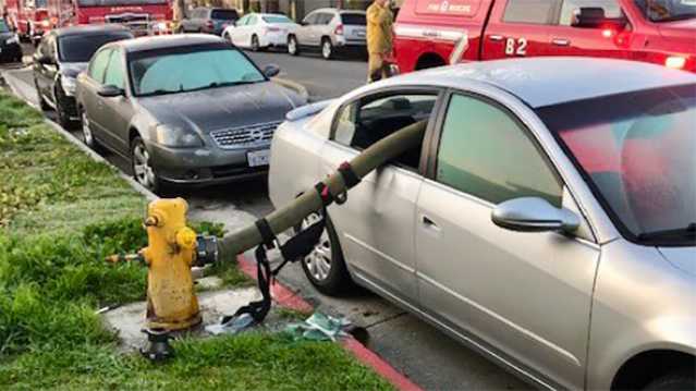Car parked by fire hydrant