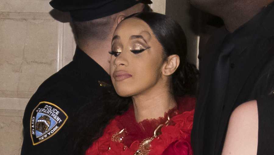 Cardi B, with a bump on her forehead, leaves after an altercation at the Harper's BAZAAR "ICONS by Carine Roitfeld" party at The Plaza on Friday, Sept. 7, 2018, New York.