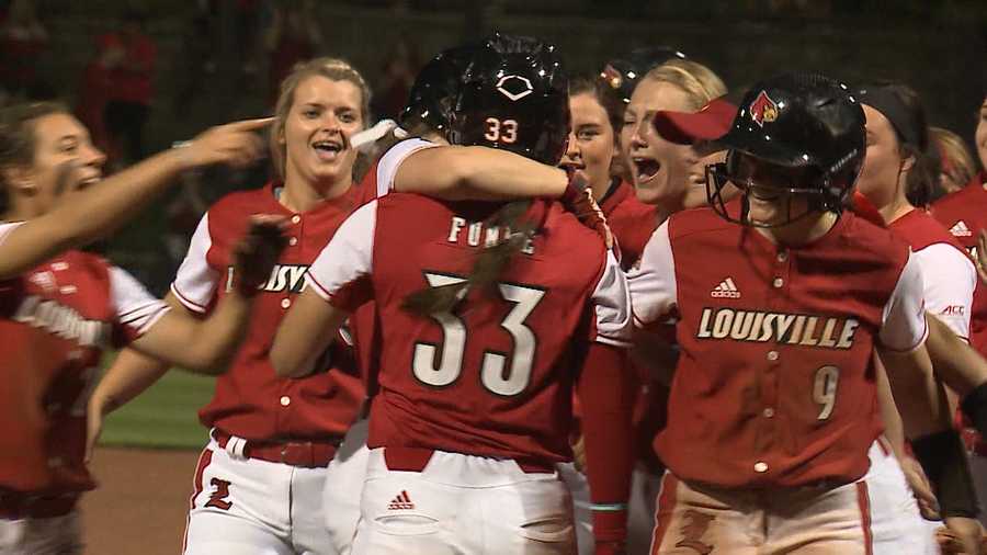 Celene Funke and the Louisville softball team celebrate 8-7 walk-off win over the Kentucky Wildcats.