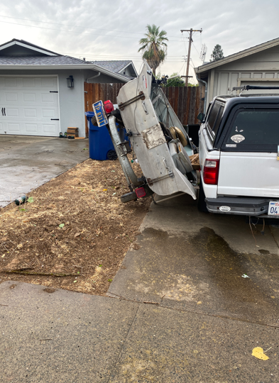 Winds knocked over this boat in Carmichael.