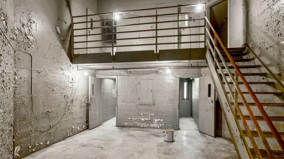 Photos show the inside of the Cass County Jail which is for sale
