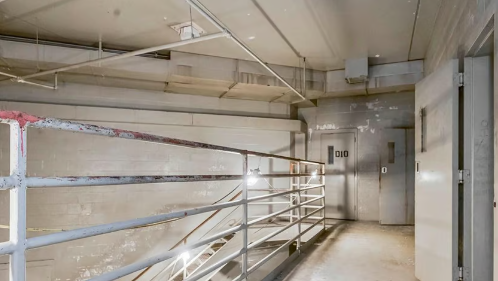 Photos show the inside of the Cass County Jail which is for sale
